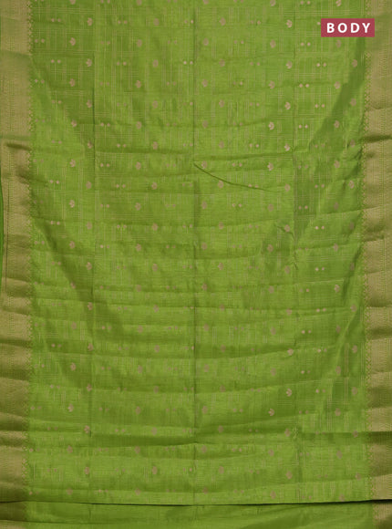 Semi raw silk saree light green with allover zari checks & buttas and zari woven border