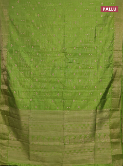 Semi raw silk saree light green with allover zari checks & buttas and zari woven border