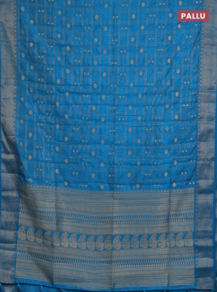 Semi raw silk saree cs blue with allover zari checks & buttas and zari woven border