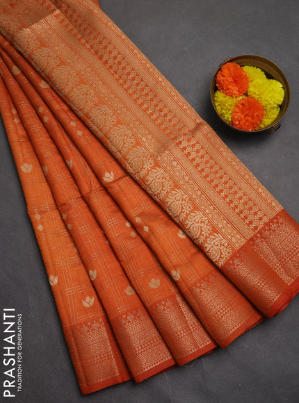 Semi raw silk saree rustic orange with allover zari checks & buttas and zari woven border