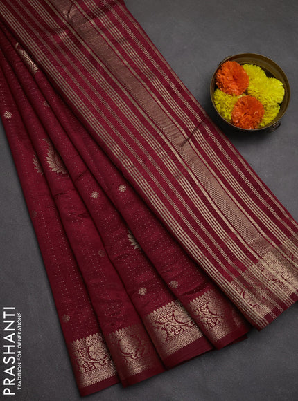 Semi raw silk saree maroon with allover zari woven buttas and zari woven border