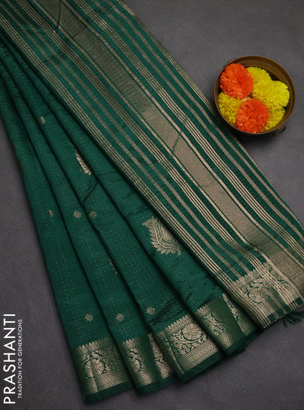 Semi raw silk saree bottle green with allover zari woven buttas and zari woven border