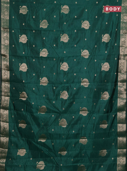 Semi raw silk saree bottle green with allover zari woven buttas and zari woven border