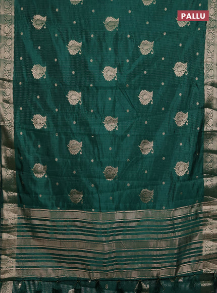 Semi raw silk saree bottle green with allover zari woven buttas and zari woven border