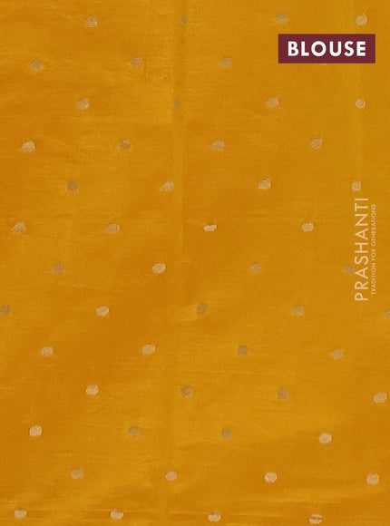 Semi raw silk saree mango yellow with allover zari woven buttas and zari woven border