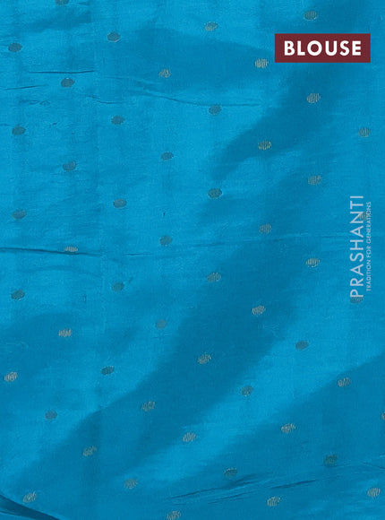 Semi raw silk saree teal blue with allover zari woven buttas and zari woven border
