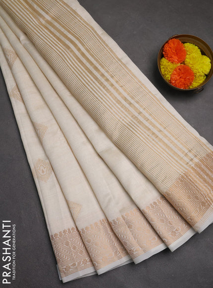 Semi raw silk saree off white with zari woven geometric buttas and zari woven border