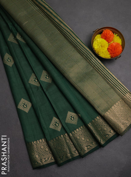 Semi raw silk saree green with zari woven geometric buttas and zari woven border