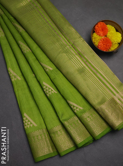 Semi raw silk saree light green with zari woven geometric buttas and zari woven border