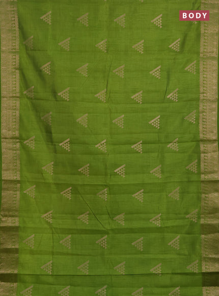 Semi raw silk saree light green with zari woven geometric buttas and zari woven border