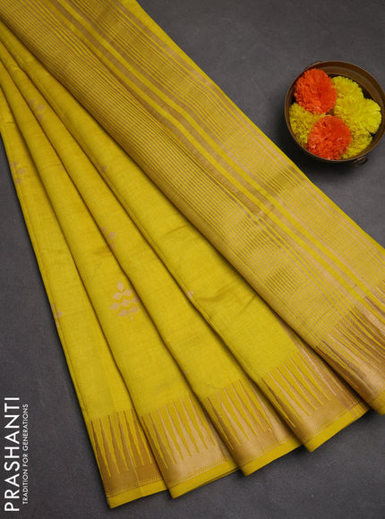 Semi raw silk saree yellow with zari woven buttas and temple design zari woven border