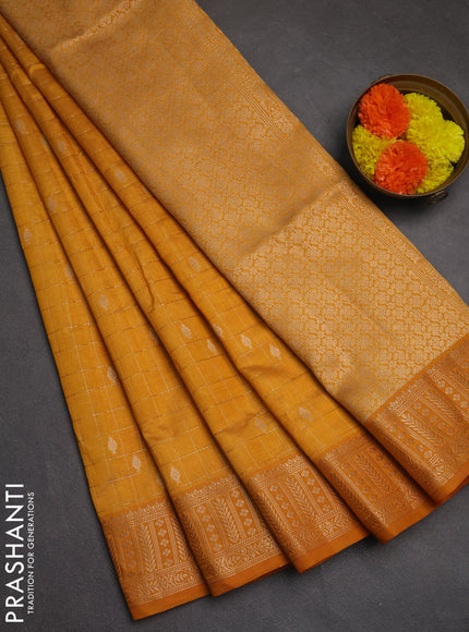 Semi raw silk saree mustard yellow with allover zari checks & buttas and zari woven border