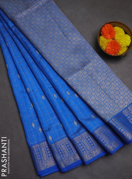 Semi raw silk saree blue with allover zari checks & buttas and zari woven border