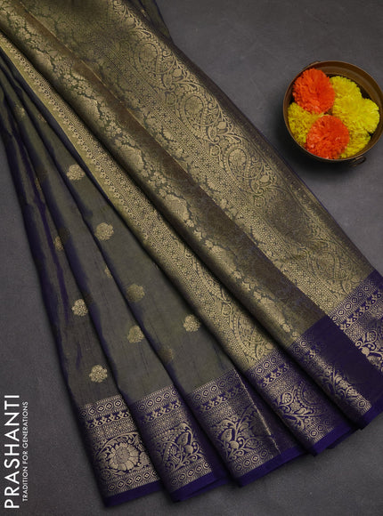 Semi raw silk saree dual tone green and dark blue with zari woven buttas and zari woven border
