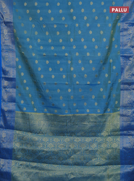 Semi raw silk saree dual tone teal blue and cs blue with zari woven buttas and zari woven border