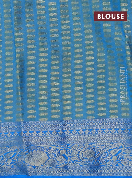 Semi raw silk saree dual tone teal blue and cs blue with zari woven buttas and zari woven border