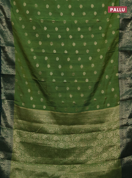 Semi raw silk saree green and dark green with zari woven buttas and zari woven border