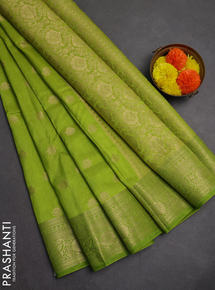 Semi raw silk saree light green with zari woven buttas and zari woven border