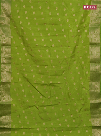 Semi raw silk saree light green with zari woven buttas and zari woven border