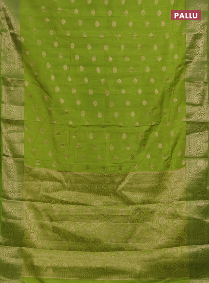 Semi raw silk saree light green with zari woven buttas and zari woven border