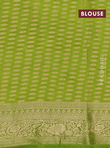Semi raw silk saree light green with zari woven buttas and zari woven border