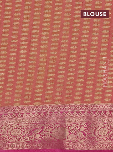 Semi raw silk saree dual tone yellowish pink and pink with zari woven buttas and zari woven border