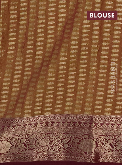 Semi raw silk saree dual tone greenish wine and wine with zari woven buttas and zari woven border