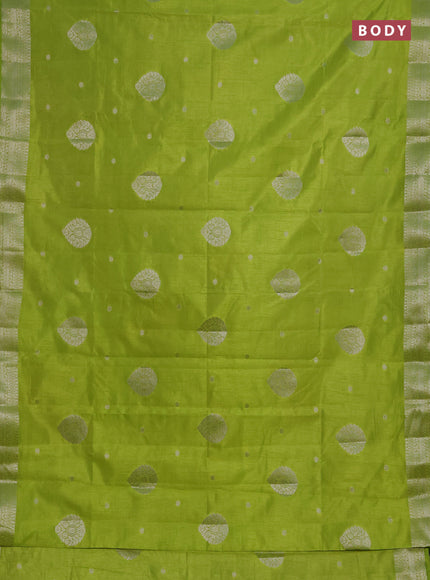 Semi raw silk saree light green with zari woven buttas and zari woven border
