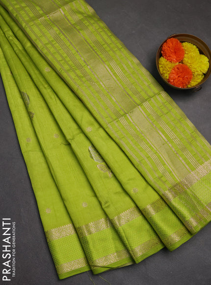 Semi raw silk saree light green with zari woven floral buttas and rettpet zari woven border