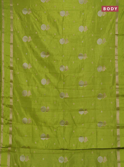 Semi raw silk saree light green with zari woven floral buttas and rettpet zari woven border