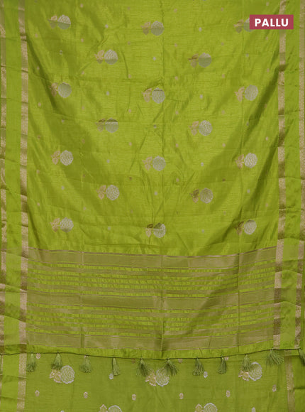 Semi raw silk saree light green with zari woven floral buttas and rettpet zari woven border