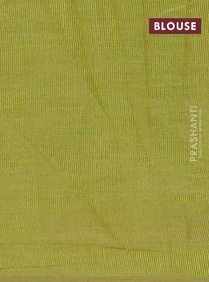 Semi raw silk saree light green with zari woven floral buttas and rettpet zari woven border