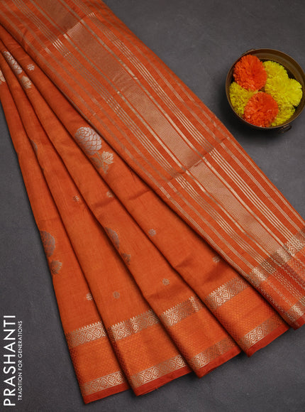 Semi raw silk saree rustic orange with zari woven floral buttas and rettpet zari woven border