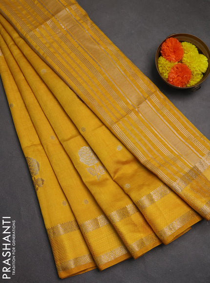 Semi raw silk saree yellow with zari woven floral buttas and rettpet zari woven border
