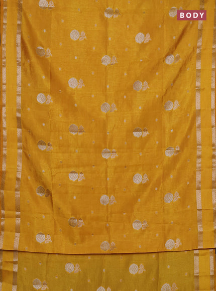 Semi raw silk saree yellow with zari woven floral buttas and rettpet zari woven border