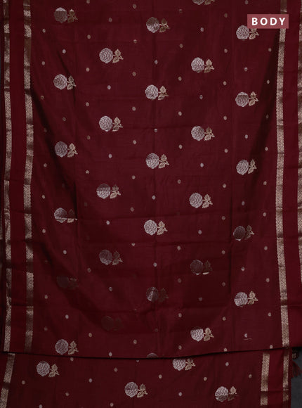 Semi raw silk saree maroon with zari woven floral buttas and rettpet zari woven border