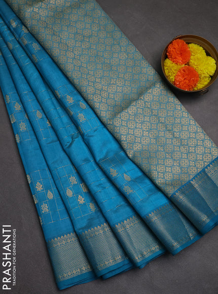 Semi raw silk saree teal blue with allover zari checks & buttas and zari woven border