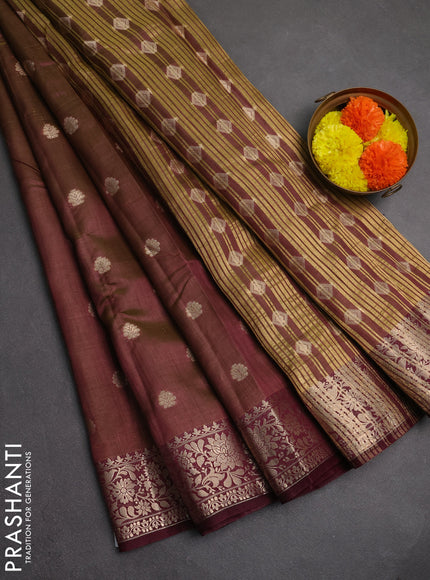 Semi raw silk saree dual shade of greenish wine with zari woven buttas and zari woven border