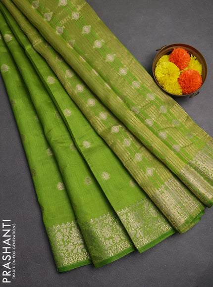 Semi raw silk saree light green with zari woven buttas and zari woven border