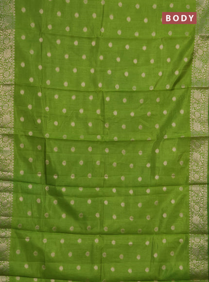 Semi raw silk saree light green with zari woven buttas and zari woven border
