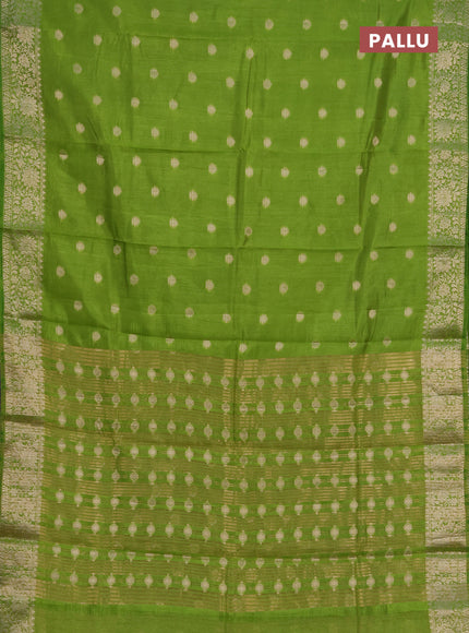 Semi raw silk saree light green with zari woven buttas and zari woven border