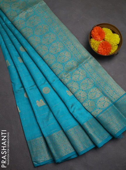 Semi raw silk saree teal blue with allover zari weaves & buttas and zari woven border