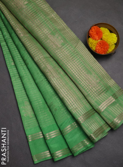 Semi raw silk saree light green with allover zari weaves and rettapet zari woven border