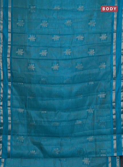 Semi raw silk saree teal blue with allover zari weaves and rettapet zari woven border