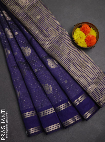 Semi raw silk saree blue with allover zari weaves and rettapet zari woven border