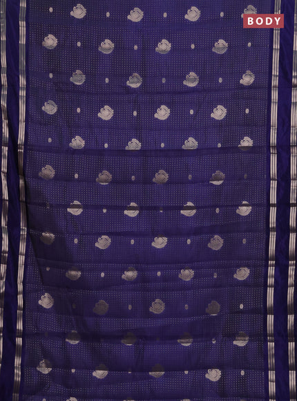 Semi raw silk saree blue with allover zari weaves and rettapet zari woven border