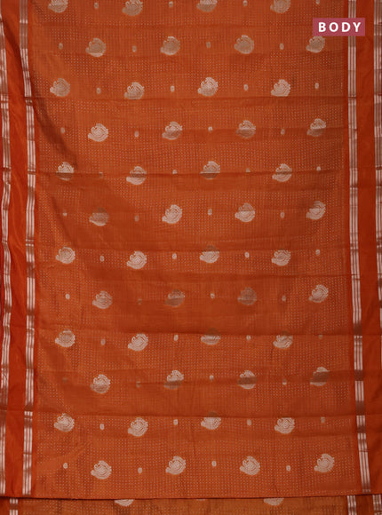 Semi raw silk saree orange with allover zari weaves and rettapet zari woven border