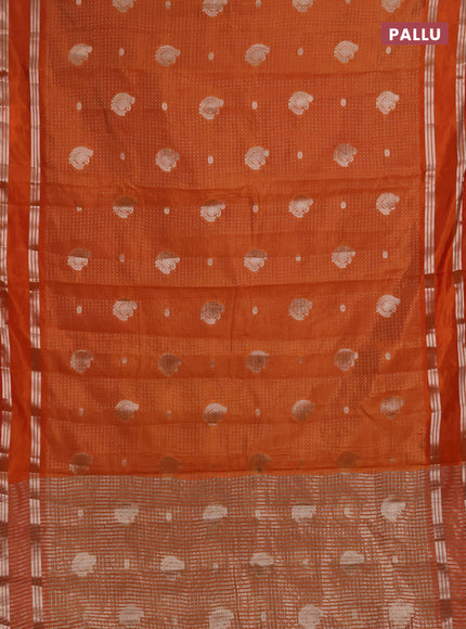 Semi raw silk saree orange with allover zari weaves and rettapet zari woven border