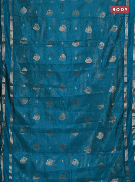 Semi raw silk saree teal blue with allover zari weaves and rettapet zari woven border
