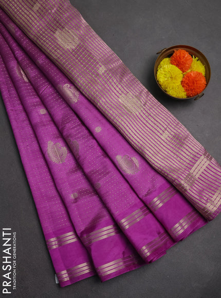 Semi raw silk saree lavender with allover zari weaves and rettapet zari woven border
